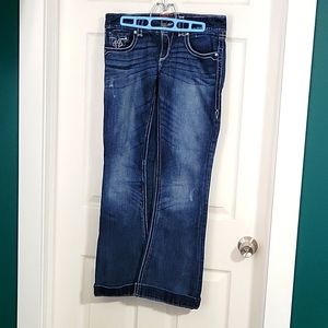 Women's denim blue jeans, flare leg decorative pocket design. Maurices size 7/8r
